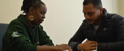 Teenage interns gain legal work experience in South Africa observing the Projects Abroad Human Rights Project Coordinator during consultations A lawyer consults with a client on the Law and Human Rights internship for teenagers in South Africa